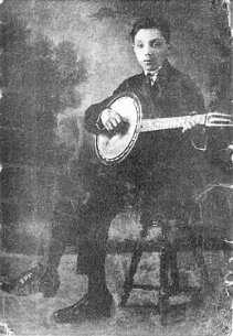 Young Django with Banjo null