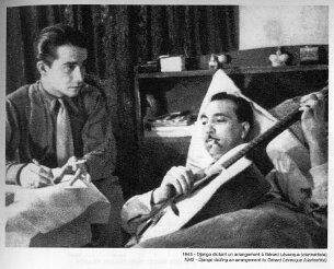 Django Reinhardt dans son lit dictant un arrangement à Gérard Leveque null