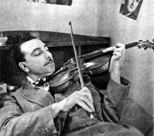 Django Reinhatdt joue du violon null