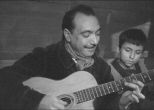 1952 - Django Reinhardt - La-Route-du-Bonheur-Still-3-400x284 null